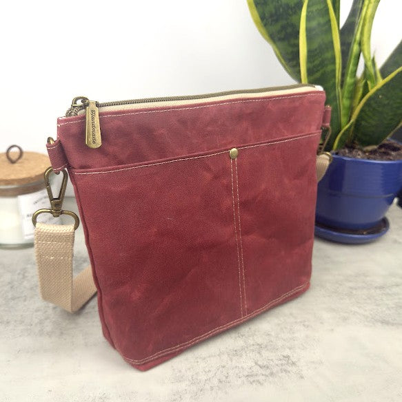 Red waxed canvas crossbody bag